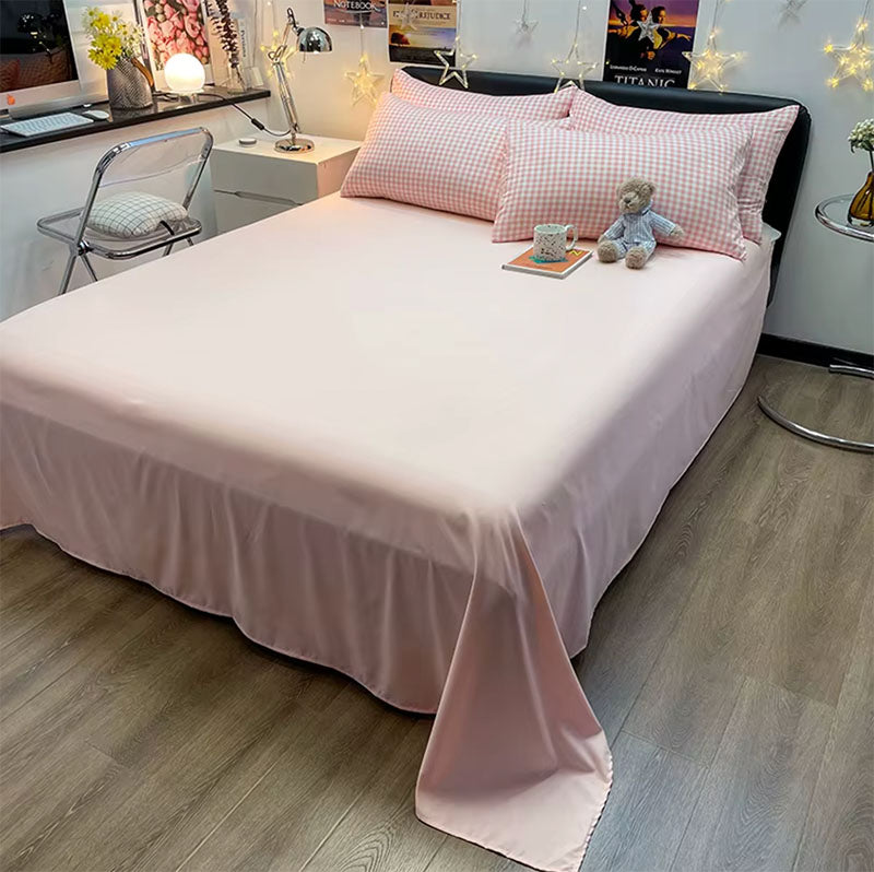 aperçu du drap housse rose vendu avec sa housse vichy